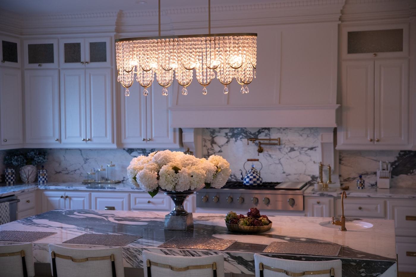 Kitchen with chandelier and lighting controlled by Control4